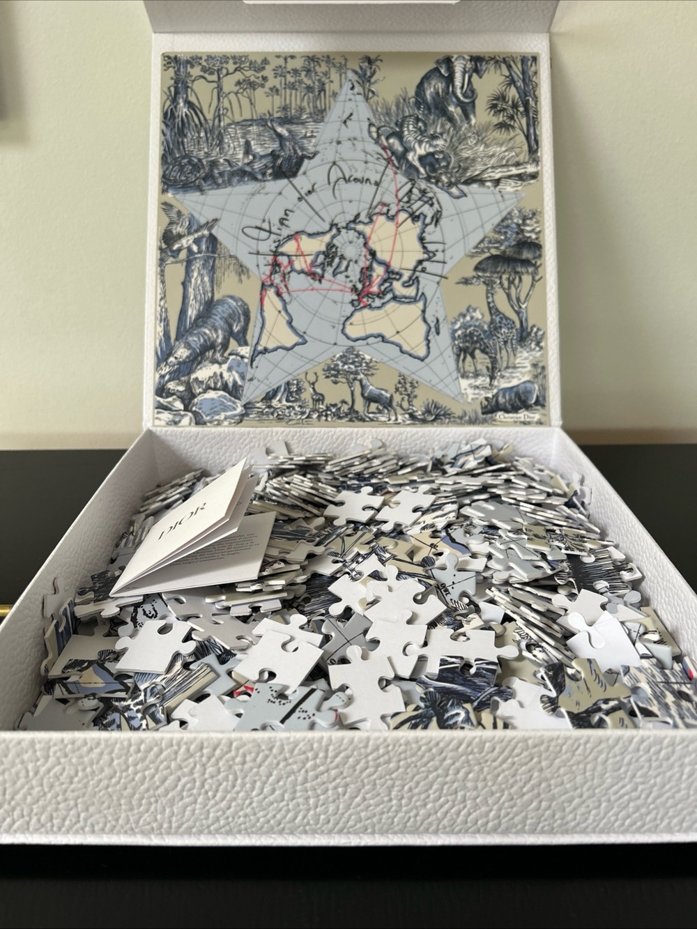 Dior “Around the World” exclusive 500-piece VIP gift puzzle